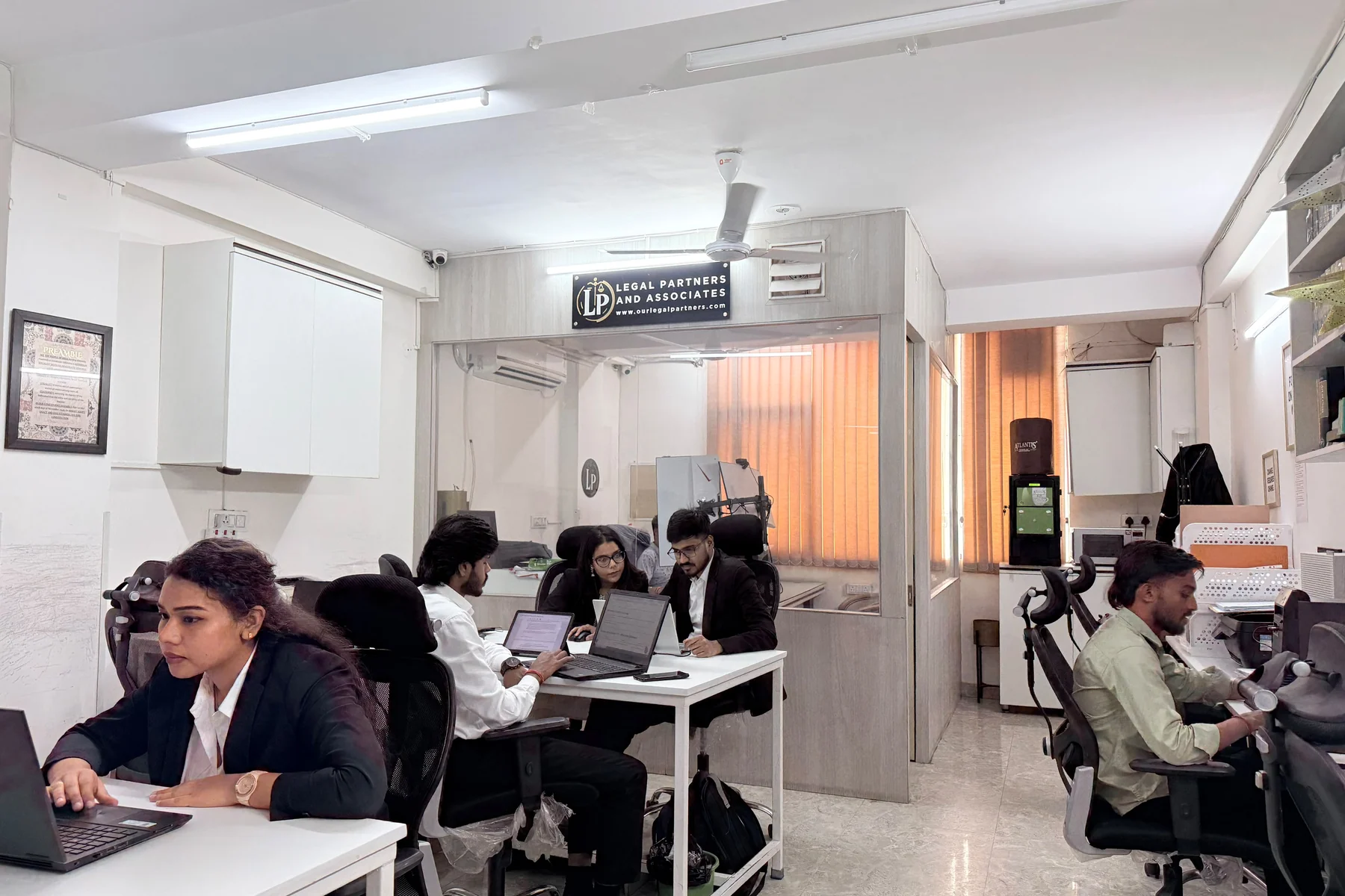 The office of Legal Partners & Associates at Shakarpur, New Delhi, with the team at work